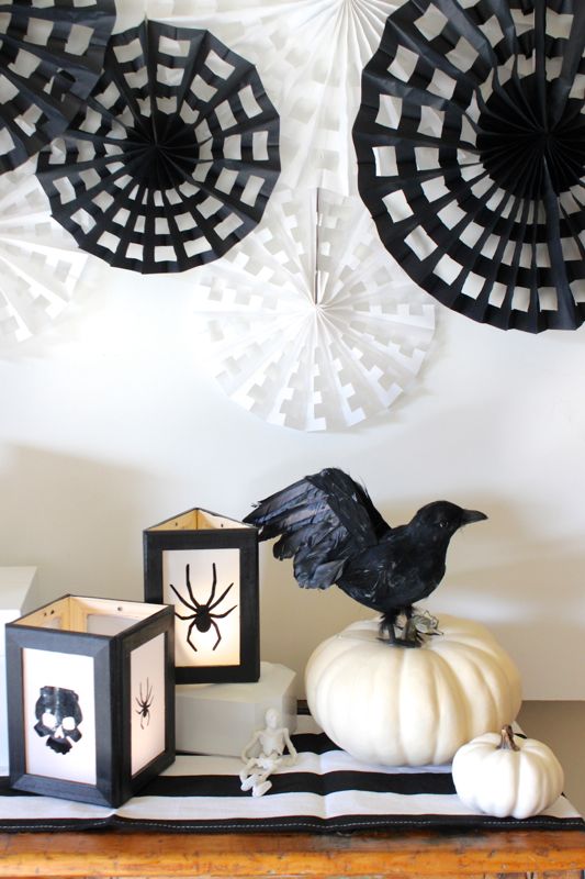 black-and-white-halloween-decor-with-spider-and-bat-silhouette-lanters