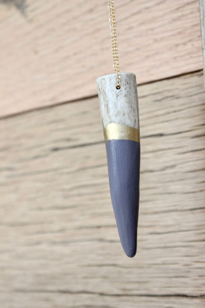 antler-necklace-grey-gold-accessory-wood-wall