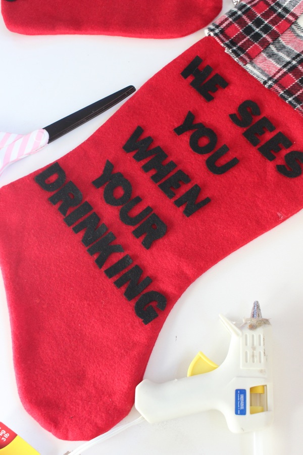 red-stockings-black-felt-letters-he-sees-you-when-your-drinking