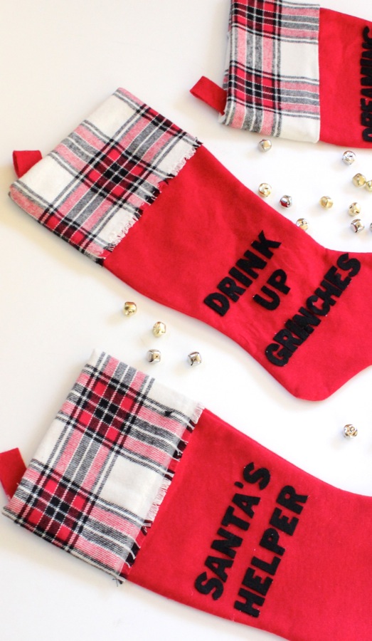 red-and-plaid-stockings-with-funny-lines-diy-boxed-wine-stocking-holder